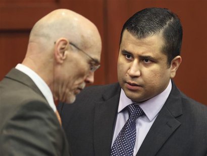 George Zimmerman talks to defense counsel Don West after the jury leaves the courtroom for more deliberations in Sanford, Florida July 13, 2 George Zimmerman talks to defense counsel Don West after the jury leaves the courtroom for more deliberations in Sanford, Florida July 13, 2