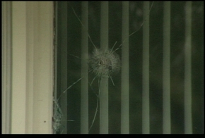 Bullet holes in a house in East Grand Forks, Minn. Bullet holes in a house in East Grand Forks, Minn.