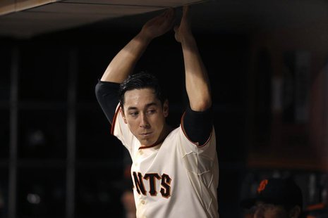 San Francisco Giants starting pitcher Tim Lincecum rests in the dugout during the seventh inning of his MLB American League baseball game ag San Francisco Giants starting pitcher Tim Lincecum rests in the dugout during the seventh inning of his MLB American League baseball game ag