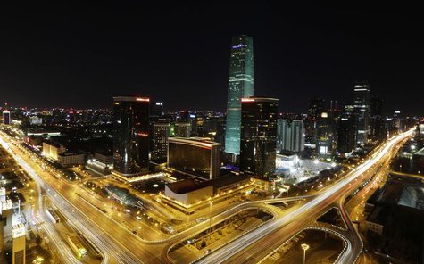 A general view of the China World Trade Centre Tower III is seen before Earth Hour in Beijing's central business district March 23, 2013. RE A general view of the China World Trade Centre Tower III is seen before Earth Hour in Beijing's central business district March 23, 2013. RE