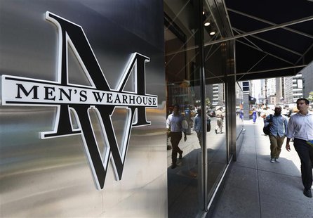 People pass by a Men's Wearhouse store in New York June 25, 2013. REUTERS/Brendan McDermid People pass by a Men's Wearhouse store in New York June 25, 2013. REUTERS/Brendan McDermid