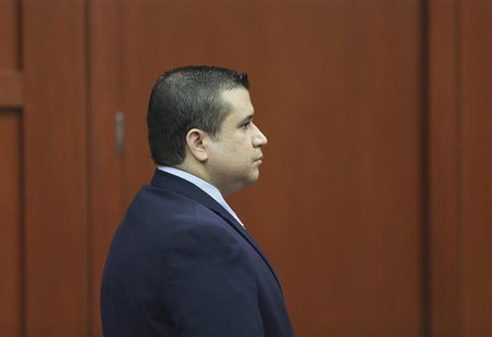 George Zimmerman stands alone at the defense table moments after the jury left the courtroom to deliberate during his trial in Seminole circ George Zimmerman stands alone at the defense table moments after the jury left the courtroom to deliberate during his trial in Seminole circ