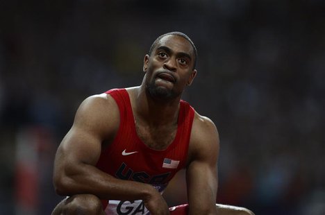Tyson Gay of the U.S. reacts after finishing fourth in the men's 100m final during the London 2012 Olympic Games at the Olympic Stadium in t Tyson Gay of the U.S. reacts after finishing fourth in the men's 100m final during the London 2012 Olympic Games at the Olympic Stadium in t