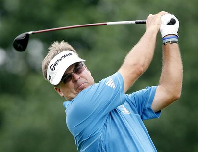 Kenny Perry of the U.S. watches his tee shot on the first hole during the third round of the Memorial Tournament at Muirfield Village Golf C Kenny Perry of the U.S. watches his tee shot on the first hole during the third round of the Memorial Tournament at Muirfield Village Golf C