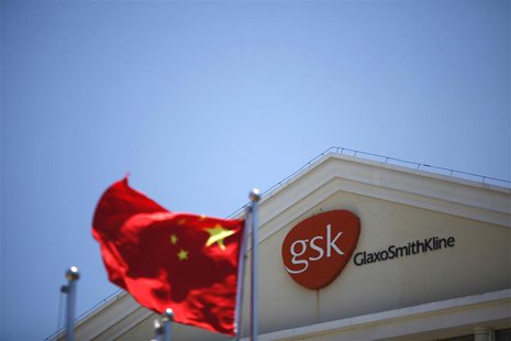 A Chinese national flag flutters in front of a GlaxoSmithKline (GSK) office building in Shanghai in this July 12, 2013 file photo. REUTERS/A A Chinese national flag flutters in front of a GlaxoSmithKline (GSK) office building in Shanghai in this July 12, 2013 file photo. REUTERS/A
