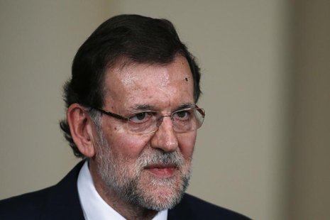 Spain's Prime Minister Mariano Rajoy attends a presentation on social action entities at the Moncloa Palace in Madrid July 11, 2013. REUTERS Spain's Prime Minister Mariano Rajoy attends a presentation on social action entities at the Moncloa Palace in Madrid July 11, 2013. REUTERS