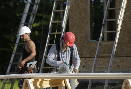 Carpenters cut fascia trimwork at a housing site at Mid-Atlantic Builders "The Villages of Savannah" development in Brandywine, Maryland May Carpenters cut fascia trimwork at a housing site at Mid-Atlantic Builders "The Villages of Savannah" development in Brandywine, Maryland May