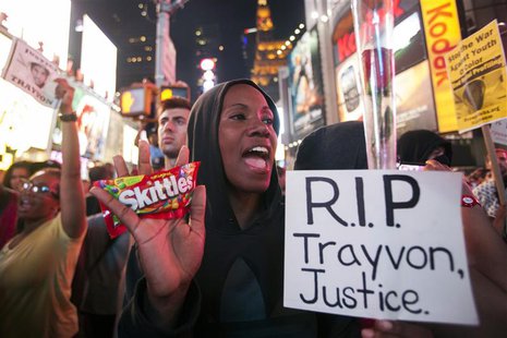 Protester Keisha Martin-Hall holds a bag of Skittles as she participates in a rally in response to the acquittal of George Zimmerman in the Protester Keisha Martin-Hall holds a bag of Skittles as she participates in a rally in response to the acquittal of George Zimmerman in the