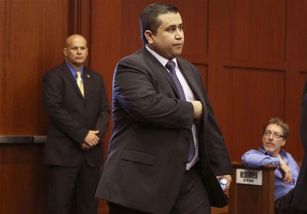 George Zimmerman enters the courtroom for his trial in Sanford, Florida July 13, 2013 during the trial of George Zimmerman in the shooting d George Zimmerman enters the courtroom for his trial in Sanford, Florida July 13, 2013 during the trial of George Zimmerman in the shooting d