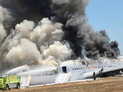 Asiana Airlines Boeing 777 is engulfed in smoke on the tarmac after a crash landing at San Francisco International Airport in California Jul Asiana Airlines Boeing 777 is engulfed in smoke on the tarmac after a crash landing at San Francisco International Airport in California Jul