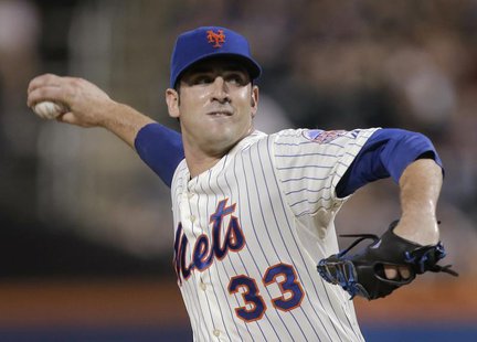 New York Mets starting pitcher Matt Harvey throws a pitch to the Arizona Diamondbacks in the first inning of their MLB National League game New York Mets starting pitcher Matt Harvey throws a pitch to the Arizona Diamondbacks in the first inning of their MLB National League game