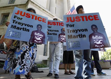 Members of the National Black Church Initiative protest as they ask for justice for Trayvon Martin, outside the Department of Justice in Was Members of the National Black Church Initiative protest as they ask for justice for Trayvon Martin, outside the Department of Justice in Was
