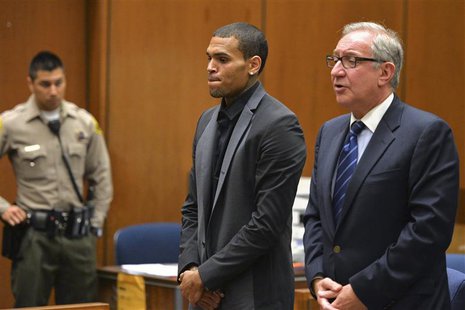 Singer Chris Brown and attorney Mark Geragos (R) attend a probation progress hearing in Los Angeles Superior Court July 15, 2013. REUTERS/Al Singer Chris Brown and attorney Mark Geragos (R) attend a probation progress hearing in Los Angeles Superior Court July 15, 2013. REUTERS/Al