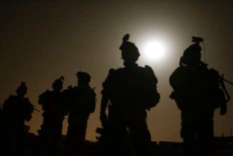 U.S. soldiers stand in front of a base before they start a night mission in Baquba early June 28 , 2007. REUTERS/Goran Tomasevic U.S. soldiers stand in front of a base before they start a night mission in Baquba early June 28 , 2007. REUTERS/Goran Tomasevic