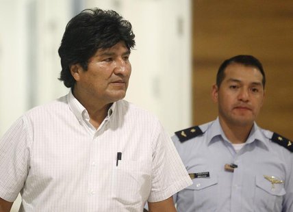 Bolivian President Evo Morales (L) is accompanied by his aide-de-camp at the Vienna International Airport in Schwechat July 3, 2013. REUTERS Bolivian President Evo Morales (L) is accompanied by his aide-de-camp at the Vienna International Airport in Schwechat July 3, 2013. REUTERS