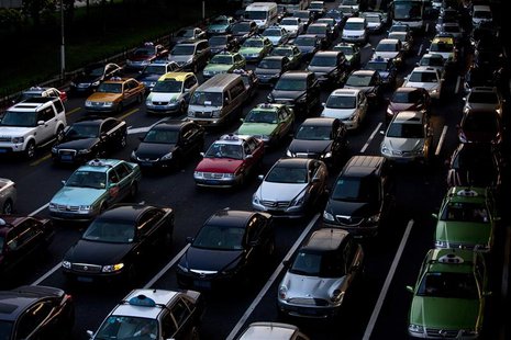 Lines of cars are pictured during a rush hour traffic jam in central Shanghai in this July 11, 2013 file photo. REUTERS/Aly Song/Files Lines of cars are pictured during a rush hour traffic jam in central Shanghai in this July 11, 2013 file photo. REUTERS/Aly Song/Files