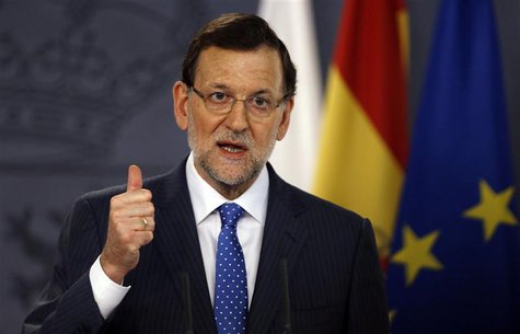 Spain's Prime Minister Mariano Rajoy gestures during a joint news conference with his Polish counterpart Donald Tusk (not pictured) at Moncl Spain's Prime Minister Mariano Rajoy gestures during a joint news conference with his Polish counterpart Donald Tusk (not pictured) at Moncl