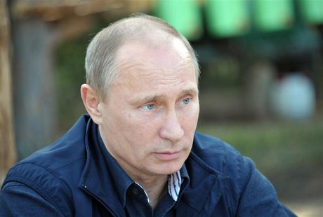 Russia's President Vladimir Putin meets with members of the Russian Geographical Society's expedition on the Gogland Island in the Gulf of F Russia's President Vladimir Putin meets with members of the Russian Geographical Society's expedition on the Gogland Island in the Gulf of F