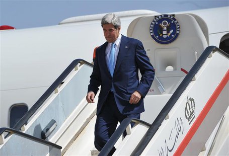 U.S. Secretary of State John Kerry steps off his plane upon his arrival at Queen Alia International Airport in Amman, July 16, 2013. REUTERS U.S. Secretary of State John Kerry steps off his plane upon his arrival at Queen Alia International Airport in Amman, July 16, 2013. REUTERS