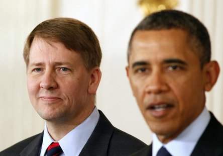 President Barack Obama (R) speaks next to Richard Cordray after Obama announced Cordray's renomination to lead the Consumer Financial Protec President Barack Obama (R) speaks next to Richard Cordray after Obama announced Cordray's renomination to lead the Consumer Financial Protec