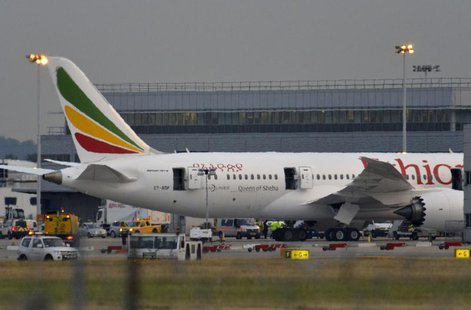 Emergency services attend to a Boeing 787 Dreamliner, operated by Ethiopian Airlines, after it caught fire at Britain's Heathrow airport in Emergency services attend to a Boeing 787 Dreamliner, operated by Ethiopian Airlines, after it caught fire at Britain's Heathrow airport in