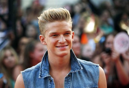 Singer Cody Simpson arrives on the red carpet for the MuchMusic Video Awards in Toronto in this file photo taken June 16, 2013. REUTERS/Mark Singer Cody Simpson arrives on the red carpet for the MuchMusic Video Awards in Toronto in this file photo taken June 16, 2013. REUTERS/Mark