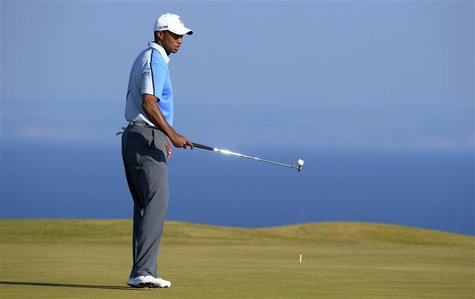 Tiger Woods of the U.S. flips the ball up with his putter on the 11th green during a practice round ahead of the British Open golf champions Tiger Woods of the U.S. flips the ball up with his putter on the 11th green during a practice round ahead of the British Open golf champions