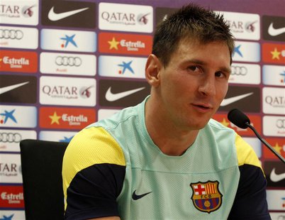 Barcelona's Lionel Messi listens to a question during a news conference after a training session at Ciutat Esportiva Joan Gamper in Sant Joa Barcelona's Lionel Messi listens to a question during a news conference after a training session at Ciutat Esportiva Joan Gamper in Sant Joa