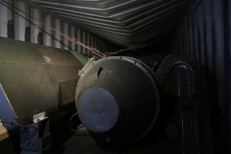 A long, green missile-shaped object is seen inside the North Korean flagged ship "Chong Chon Gang" docked at the Manzanillo Container Termin A long, green missile-shaped object is seen inside the North Korean flagged ship "Chong Chon Gang" docked at the Manzanillo Container Termin