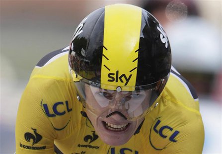 Race leader's yellow jersey holder Team Sky rider Christopher Froome of Britain cycles to win the 32km individual time-trial seventeenth sta Race leader's yellow jersey holder Team Sky rider Christopher Froome of Britain cycles to win the 32km individual time-trial seventeenth sta