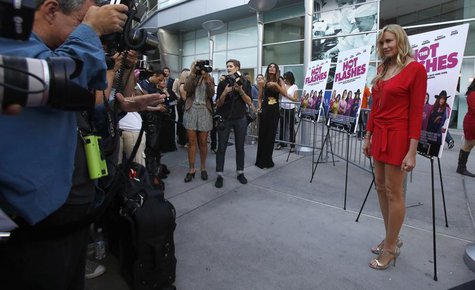 Cast member Daryl Hannah (R) poses at the premiere of "The Hot Flashes" in Los Angeles, California June 27, 2013. The movie opens limitedly Cast member Daryl Hannah (R) poses at the premiere of "The Hot Flashes" in Los Angeles, California June 27, 2013. The movie opens limitedly