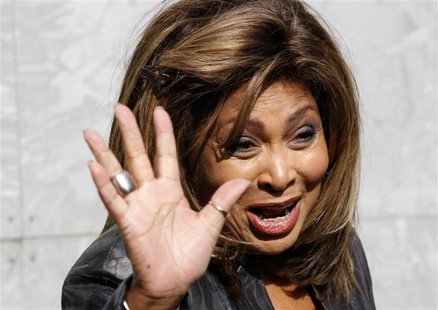 U.S. singer Tina Turner waves during a photocall before the Emporio Armani Autumn/Winter 2011 women's collection show at Milan Fashion Week U.S. singer Tina Turner waves during a photocall before the Emporio Armani Autumn/Winter 2011 women's collection show at Milan Fashion Week