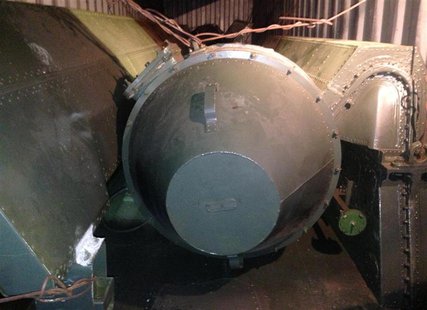 A long, green missile-shaped object is seen inside the North Korean flagged ship "Chong Chon Gang" docked at the Manzanillo Container Termin A long, green missile-shaped object is seen inside the North Korean flagged ship "Chong Chon Gang" docked at the Manzanillo Container Termin