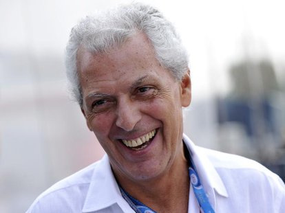 Pirelli president Marco Tronchetti Provera smiles in the paddock after the third practice session of the Italian F1 Grand Prix at the Monza Pirelli president Marco Tronchetti Provera smiles in the paddock after the third practice session of the Italian F1 Grand Prix at the Monza