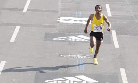 Ethiopia's marathon runner Haile Gebrselassie arrives at the finish line to set a new world record at the 35th Berlin marathon in Berlin Sep Ethiopia's marathon runner Haile Gebrselassie arrives at the finish line to set a new world record at the 35th Berlin marathon in Berlin Sep