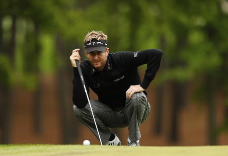 David Lynn of England lines up a putt on the third hole during the final round of the Wells Fargo Championship PGA golf tournament at the Qu David Lynn of England lines up a putt on the third hole during the final round of the Wells Fargo Championship PGA golf tournament at the Qu