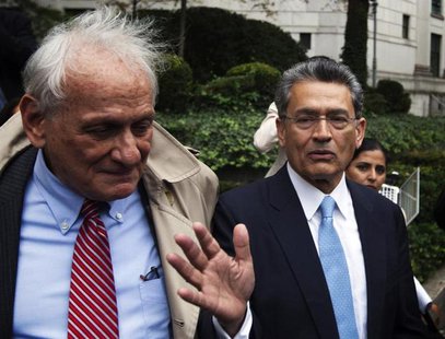 Former Goldman Sachs Group Inc board member Rajat Gupta (R) departs Manhattan Federal Court with his lawyer, Gary Naftalis (L) after being s Former Goldman Sachs Group Inc board member Rajat Gupta (R) departs Manhattan Federal Court with his lawyer, Gary Naftalis (L) after being s