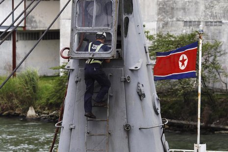 A worker inspects the North Korean flagged ship "Chong Chon Gang" docked at the Manzanillo Container Terminal in Colon City July 16, 2013. R A worker inspects the North Korean flagged ship "Chong Chon Gang" docked at the Manzanillo Container Terminal in Colon City July 16, 2013. R