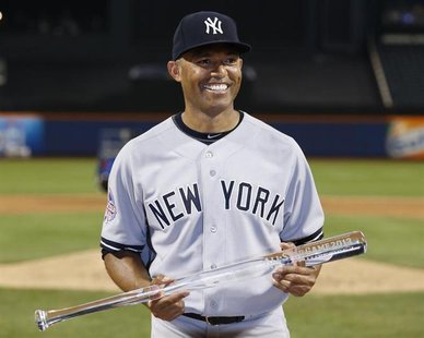 New York Yankees pitcher Mariano Rivera holds a clear bat after being named MVP of the 2013 All-Star Game following Major League Baseball's New York Yankees pitcher Mariano Rivera holds a clear bat after being named MVP of the 2013 All-Star Game following Major League Baseball's