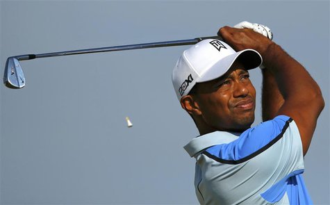 Tiger Woods of the U.S. watches his tee shot on the 16th hole during a practice round ahead of the British Open golf championship at Muirfie Tiger Woods of the U.S. watches his tee shot on the 16th hole during a practice round ahead of the British Open golf championship at Muirfie