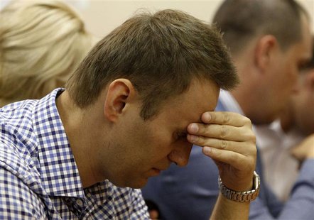 Russian protest leader Alexei Navalny attends a court hearing in Kirov, July 18, 2013. Navalny was found guilty of theft on Thursday at a tr Russian protest leader Alexei Navalny attends a court hearing in Kirov, July 18, 2013. Navalny was found guilty of theft on Thursday at a tr