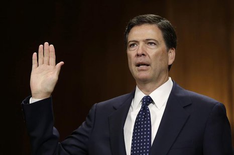 FBI director nominee James Comey is sworn in before testifying at the Senate Judiciary Committee on Capitol Hill in Washington July 9, 2013. FBI director nominee James Comey is sworn in before testifying at the Senate Judiciary Committee on Capitol Hill in Washington July 9, 2013.
