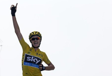 Race leader's yellow jersey Team Sky rider Christopher Froome of Britain crosses the finish line to win the 242.5 km fifteenth stage of the Race leader's yellow jersey Team Sky rider Christopher Froome of Britain crosses the finish line to win the 242.5 km fifteenth stage of the