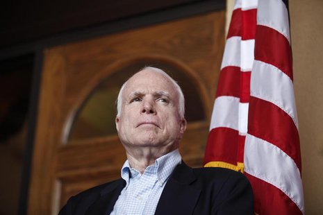 U.S. Senator John McCain (R-AZ) watches his colleagues speak during a news conference following their tour of the Arizona-Mexico border in N U.S. Senator John McCain (R-AZ) watches his colleagues speak during a news conference following their tour of the Arizona-Mexico border in N