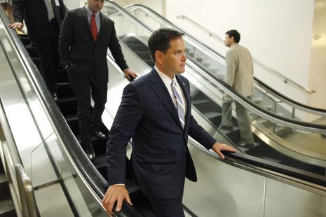 U.S. Senator Marco Rubio (R-FL) departs following the weekly Republican caucus luncheon at the U.S. Capitol in Washington June 18, 2013. REU U.S. Senator Marco Rubio (R-FL) departs following the weekly Republican caucus luncheon at the U.S. Capitol in Washington June 18, 2013. REU