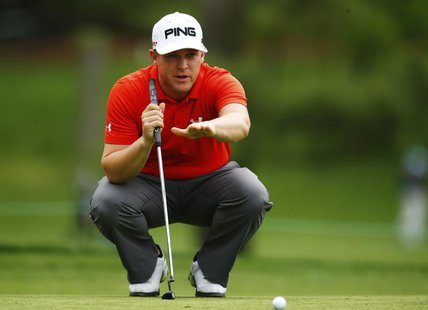 Daniel Summerhays of the U.S. reviews his putt on the 16th hole during the first round of the Wells Fargo Championship PGA golf tournament a Daniel Summerhays of the U.S. reviews his putt on the 16th hole during the first round of the Wells Fargo Championship PGA golf tournament a