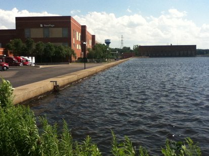 Seawall next to New Page mill in Stevens Point. This will be raised another 18 inches by Consolidated Water Power Company with work starting in August 2013. Seawall next to New Page mill in Stevens Point. This will be raised another 18 inches by Consolidated Water Power Company with work starting in August 2013.