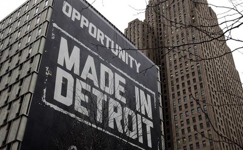 A large "Opportunity Made In Detroit" banner is seen on the side of a building in downtown Detroit, Michigan in this January 30, 2013 file p A large "Opportunity Made In Detroit" banner is seen on the side of a building in downtown Detroit, Michigan in this January 30, 2013 file p