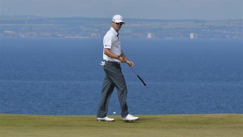 Zach Johnson of the U.S. walks on the 11th green during the first round of the British Open golf Championship at Muirfield in Scotland July Zach Johnson of the U.S. walks on the 11th green during the first round of the British Open golf Championship at Muirfield in Scotland July