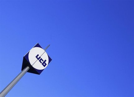 The logo of Belgian drug, chemical, and plastics group UCB is seen at the entrance of the company's headquarters in Brussels March 2, 2010. The logo of Belgian drug, chemical, and plastics group UCB is seen at the entrance of the company's headquarters in Brussels March 2, 2010.